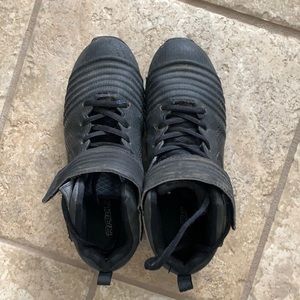 Rawlings big boys size 4 football  or baseball cleats. Only worn one season